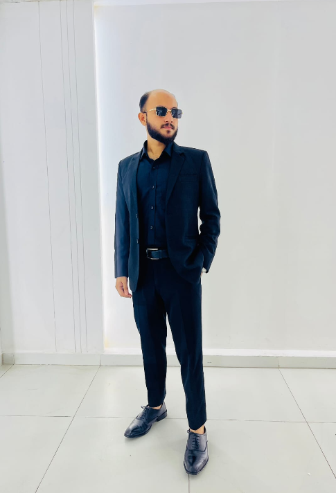 Ahtesham Sajid in a formal suit